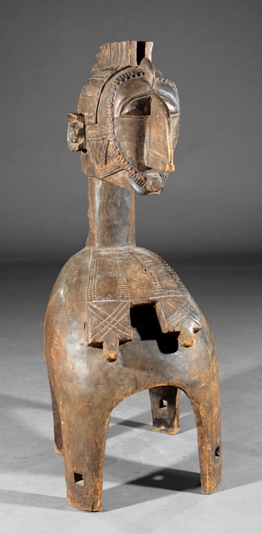 African Carved Wood Nimba Mask: African Carved Wood Nimba Mask, Baga People, Guinea, domed lower section with tall neck and elongated visage, h. 50 in