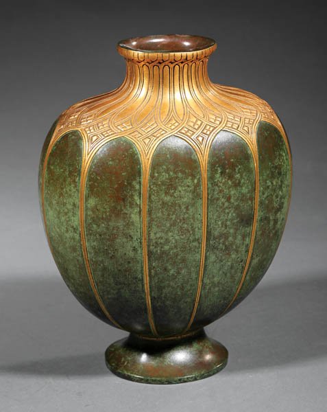 Maison Christofle Gilt and Patinated Bronze Vase: 534A. Maison Christofle Gilt and Patinated Bronze Vase, early 20th c., marked “Christofle/1002”, ribbed ovid body with flared neck, splayed foot, h. 9 3/4 in.$800/1,200