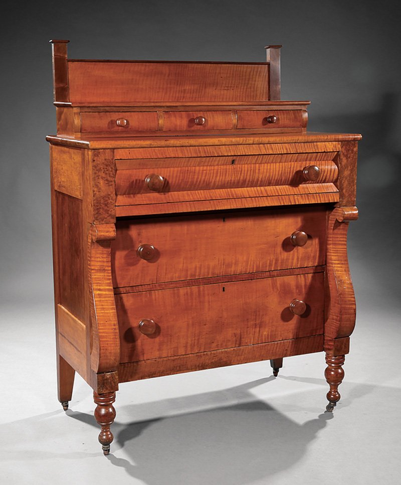 Late Classical Tiger Maple Chest of Drawers: American Late Classical Tiger Maple Chest of Drawers, c. 1840, stepped top with three glove drawers, outset bolection molded frieze drawer over two drawers, scrolled supports, turned legs, casters, h.