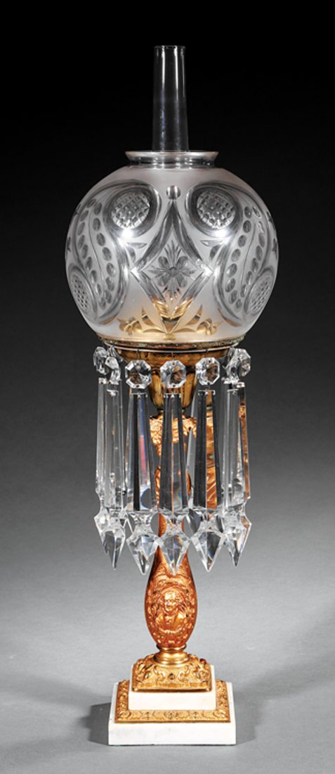 American Gilt Bronze Solar Lamp: Good American Gilt Bronze Solar Lamp, c. 1840-1850, baluster form with French-style portraits and acanthus on a stepped marble base, globe shade with fern design, spear cut prisms, h. 25 1/2 in. Prove