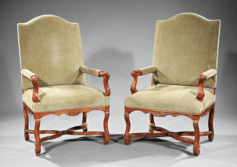 Near Pair of Regence Carved Beech Fauteuils: Near Pair of Regence Carved Beech Fauteuils, mid-18th c. and later, arched backs, scrolled arms, scalloped shell and foliate aprons, scrolled legs, shaped X-form stretchers, h. 44 in., w. 26 3/4 in.,