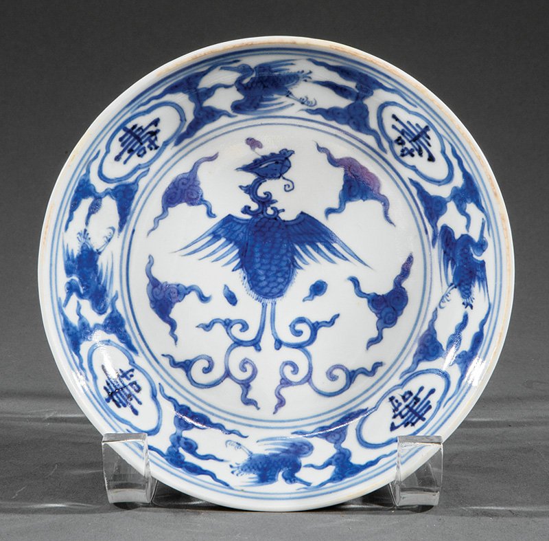Chinese Blue and White Porcelain "Phoenix" Dish: Chinese Blue and White Porcelain "Phoenix" Dish, probably 17th c., interior decorated with a central splayed-wing phoenix with alternating shou and cranes around the sides, exterior with foliate vines