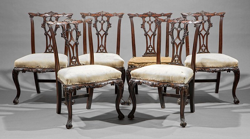 Chippendale-Style Carved Mahogany Dining Chairs: Set of Eight Chippendale-Style Carved Mahogany Dining Chairs, incl. two armchairs and six side chairs, foliate crests, gothicized pierced splats, shaped seats, cabriole legs, casters, h. 37 3/4 in., w
