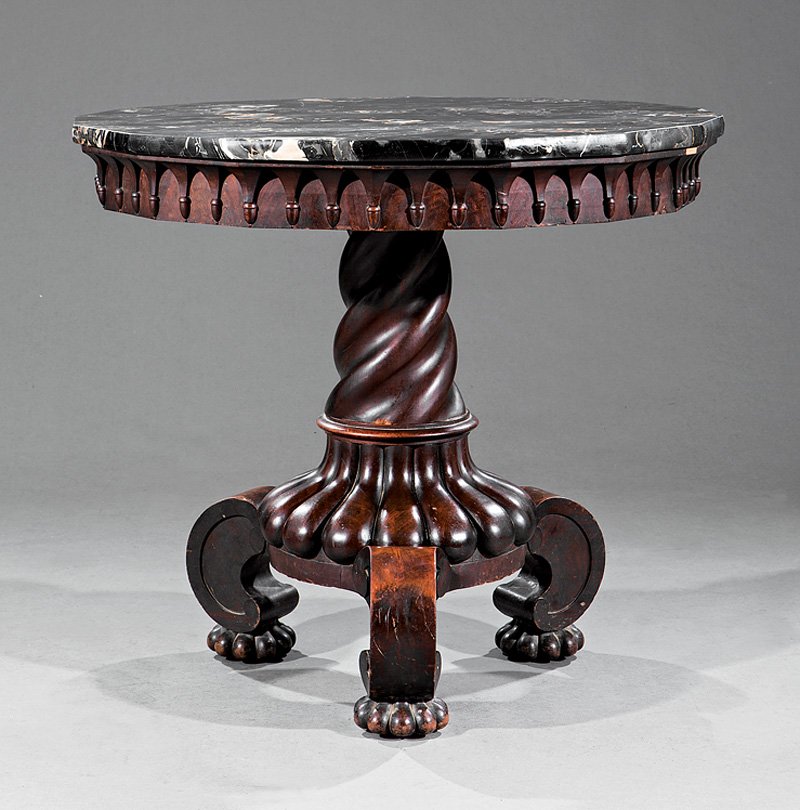 American Classical Carved Mahogany Center Table: American Classical Carved Mahogany Center Table, mid-19th c., Egyptian marble top, gothicized frieze, spiral-turned and gadrooned standard, scrolled legs, lobed disc feet, h. 31 1/4 in., dia. 36 in