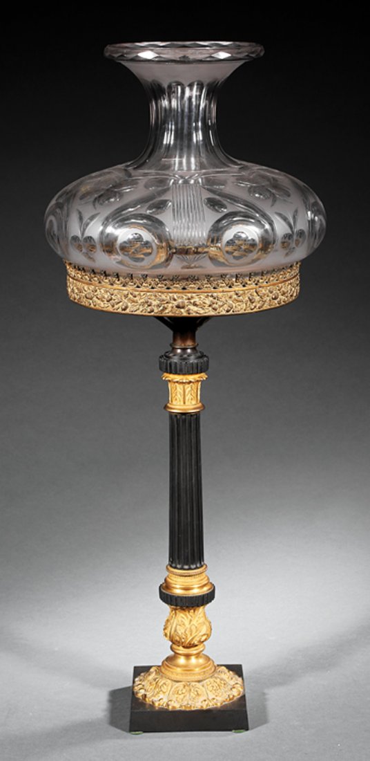 Gilt Bronze and Patinated Metal Sinumbra Lamp: American Gilt Bronze and Patinated Metal Sinumbra Lamp, c. 1835, marked with eagle and "J & I Cox / Makers. New York", reticulated floral shade ring, fluted standard, lyre-cut shade, h. 32 3/4 in., di