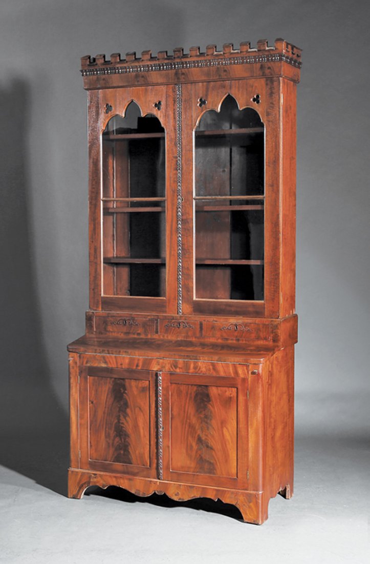 American Gothic Mahogany Secretary/Bookcase: American Gothic Mahogany Secretary/Bookcase, mid-19th c., gothicized pediment, arched glazed doors; three frieze drawers, foldover writing surface inset with leather, over cabinet doors, scalloped apr