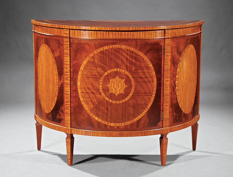 Inlaid Satinwood and Mahogany Demilune Commode: Neoclassical-Style Inlaid Satinwood and Mahogany Demilune Commode, labeled "Historic Charleston Reproductions, Baker Furniture", highly figured crossbanded top with radial inlay, case with oval panels
