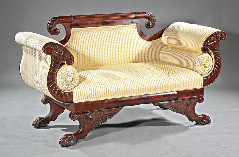 American Classical-Style Carved Mahogany Settee: American Classical-Style Carved Mahogany Settee, scrolled crest, shaped cornucopia arms, blocked and torus-molded seat rail, winged hairy paw feet, h. 36 1/4 in., w. 64 1/2 in., d. 26 1/2 in. Provenan