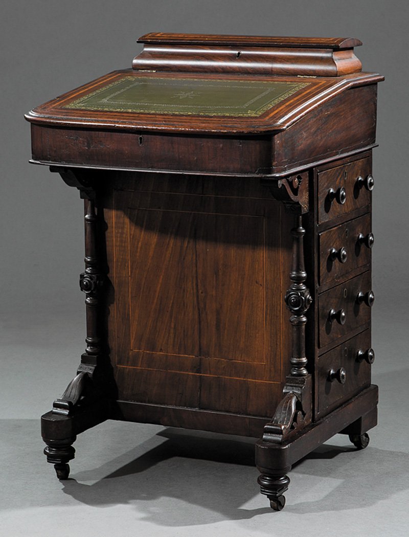 English Carved and Inlaid Walnut Davenport Desk: English Carved and Inlaid Walnut Davenport Desk, mid-19th c., ogee pen box, tooled-leather top, blind frieze drawer, eight side drawers, casters, h. 34 1/2 in., w. 21 1/2 in., d. 20 1/2 in