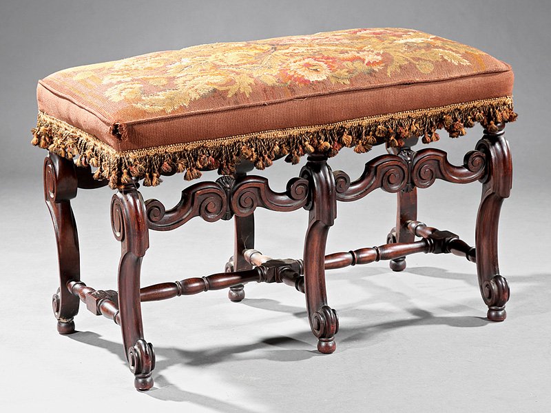 Carved Walnut and Needlepoint Banquette: Louis XIV-Style Carved Walnut and Needlepoint Banquette, S scroll legs, turned stretchers, scrolled toes, h. 22 1/2 in., w. 35 in., d. 18 1/2 in