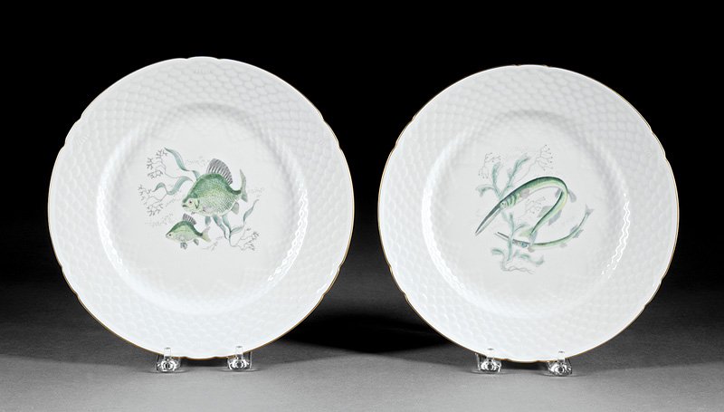 Twenty-Nine Porcelain Fish Plates, Guerin: Twenty-Nine Antique Porcelain Fish Plates, incl. 12 by Guerin, Limoges, with blue and gilt rim; 6 by A.D. Hache, Paris, with monogram "A.R.G."; and 12 with fishscale rim by B & G, Copenhagen, dia. 8 1