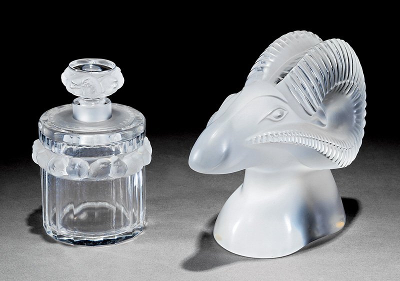 Lalique Ram's Head Glass Sculpture: Lalique Ram's Head Glass Sculpture, marked, clear and frosted body, h. 6 3/4 in.; together with a "Robinson" lidded glass perfume bottle, marked, clear body with frosted molded birds, h. 5 1/2 in