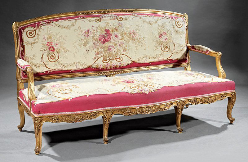 Louis XV-Style Carved and Gilt Salon Suite: Louis XV-Style Carved and Gilt Salon Suite, late 19th c., incl. canape, two chaises and two fauteuils, each retaining "Aubusson" upholstery, leaf-carved crest, acanthus scroll arms, cabriole legs, can