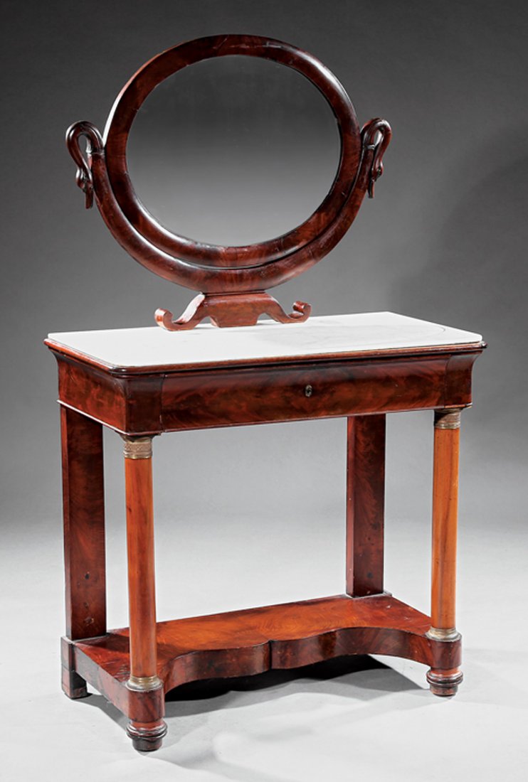 Inlaid and Carved Mahogany Dressing Table: American Classical Inlaid and Carved Mahogany Dressing Table, 19th c., New York, oval mirror with swan supports, dished marble top, frieze drawer, columnar supports with bronze mounts, shaped plinth,