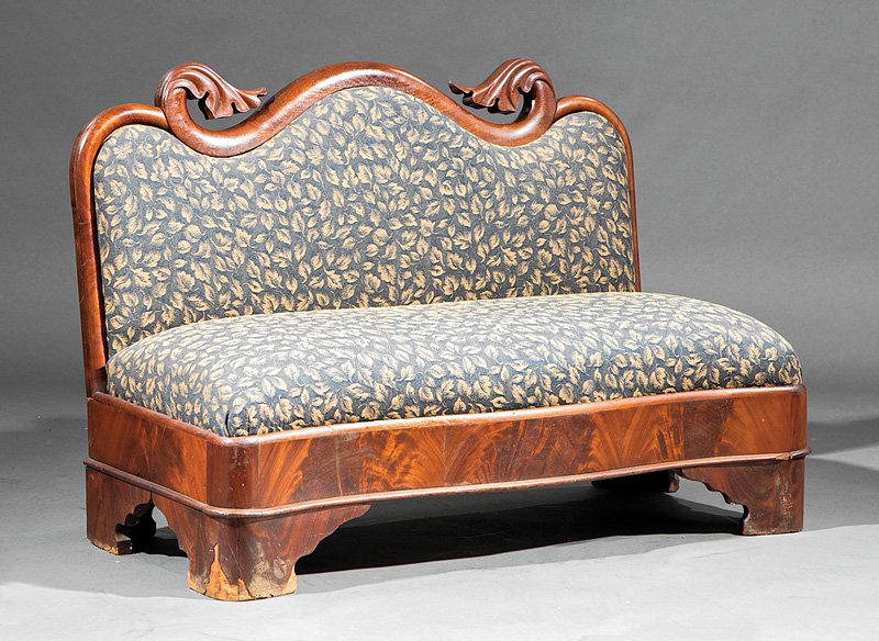 American Restauration Mahogany Slipper Settee: American Restauration Mahogany Slipper Settee, 19th c., foliate carved crest rail, molded serpentine seat rail, bracket feet, h. 30 1/2 in., w. 44 1/2 in., d. 20 1/2 in