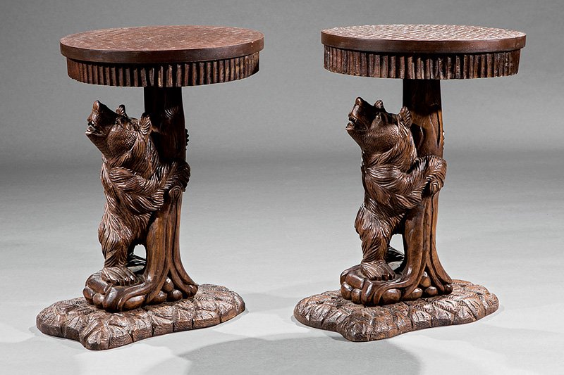 Pair of Black Forest-Style Carved Walnut Side Tables: Pair of Black Forest-Style Carved Walnut Side Tables, each with circular composite top, bear and tree standard, rockwork plinth, h. 24 in., dia. 17 1/4 in