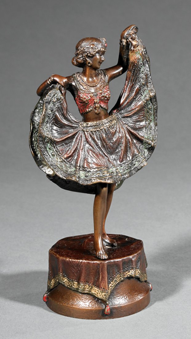 Austrian Cold-Painted Bronze Erotic Figure: Austrian Cold-Painted Bronze Erotic Figure of an Exotic Dancer, 19th c., lifting hinged skirt, Franz Bergman Foundry seal and "NamGreb" inscribed on skirt and again on self-base, h. 7 1/2 in., w. 3 1/