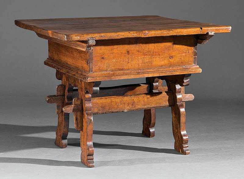 Swiss or Alsatian Pine Farm Table: Swiss or Alsatian Pine Farm Table, early 19th c., batten top opening to a well with storage drawer, molded base on arched pegged legs, h. 32 in.,. 42 in., d. 38 1/2 in
