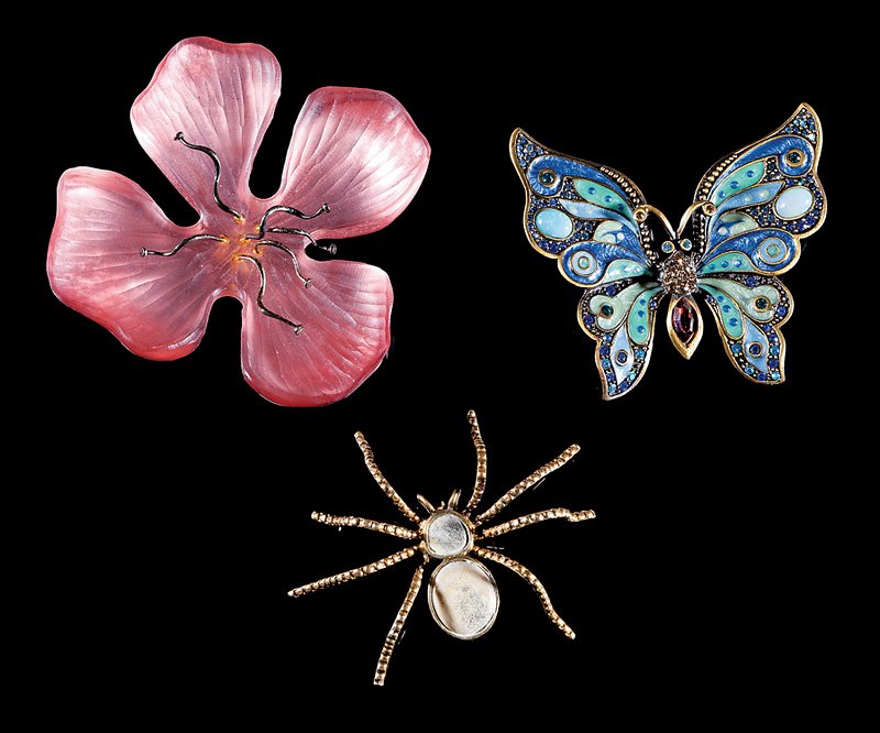 Three Costume Jewelry Brooches: Three Costume Jewelry Brooches, incl. Alex Bittar carved Lucite and metal flower, w. 3 1/4 in.; Jay Strongwater "gem" encrusted, enameled metal butterfly, w. 2 5/8 in.; and stone-inset metal spider, w