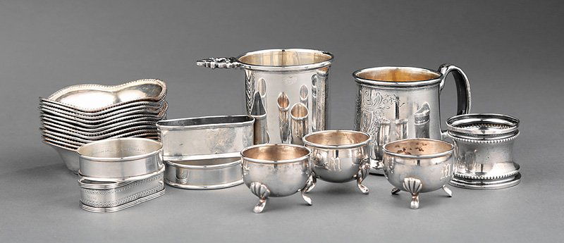Group of American Sterling Silver Objects: Group of Small American Sterling Silver Objects, 20th c., incl. 12 nut dishes, 5 napkin rings, 3 salts, cigarette urn and a baby cup, total wt. 16 troy ozs