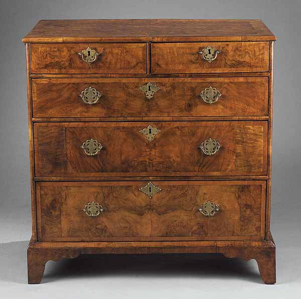 George II Banded and Figured Walnut Chest of Draw: A George II Banded and Figured Walnut Chest of Drawers , mid-18th c. and later, two short drawers above three graduated drawers, on straight bracketed feet, height 35 3/4 in., width 34 1/2 in., depth