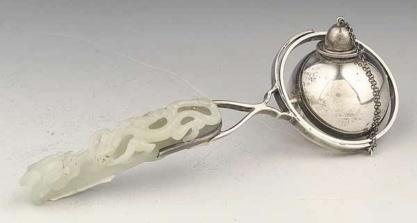 A Vintage S. & G. Gump & Co. Sterling: A Vintage S. & G. Gump & Co. Sterling Silver Cigar Lighter of Gimbal Form , with archaic mutton fat jade dragon handle, length 7 1/2 in.