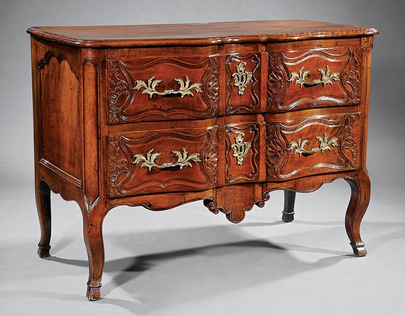 Louis XV Fruitwood Commode: Louis XV Fruitwood Commode, 18th c., serpentine top, two shell carved paneled drawers, shaped skirt, cabriole legs, hoof feet, h. 35 3/4 in., w. 48 1/4 in., d. 24 3/4 in