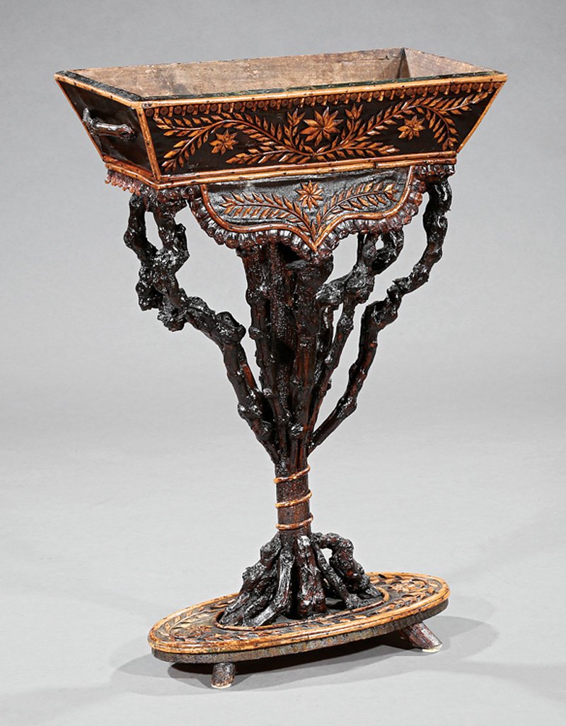 Rustic Carved Root and Vine Jardiniere: Rustic Carved Root and Vine Jardiniere, late 19th c., probably English, cut bamboo decoration, h. 32 in., w. 21 1/2 in., d. 11 in. Provenance: Gordon Getty. Ref.: Newman, Bruce. Fantasy Furniture