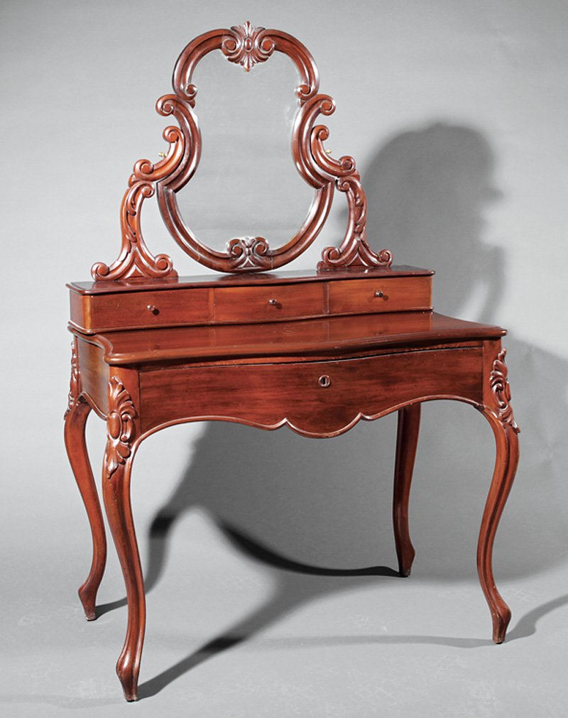 English Rococo Carved Mahogany Dressing Table: English Rococo Carved Mahogany Dressing Table, mid-19th c., mirrored superstructure with three serpentine drawers, conforming base, with long drawer, cabochon carved cabriole legs, h. 60 7/8 in., w. 3