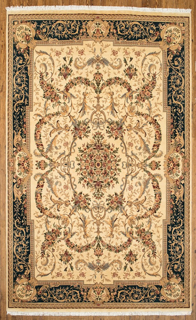 Aubusson-Style Carpet: Aubusson-Style Carpet, cream and teal ground, central bouquet, floral garlands, 9 ft. 9 1/2 in. x 13 ft. 10 1/2 in