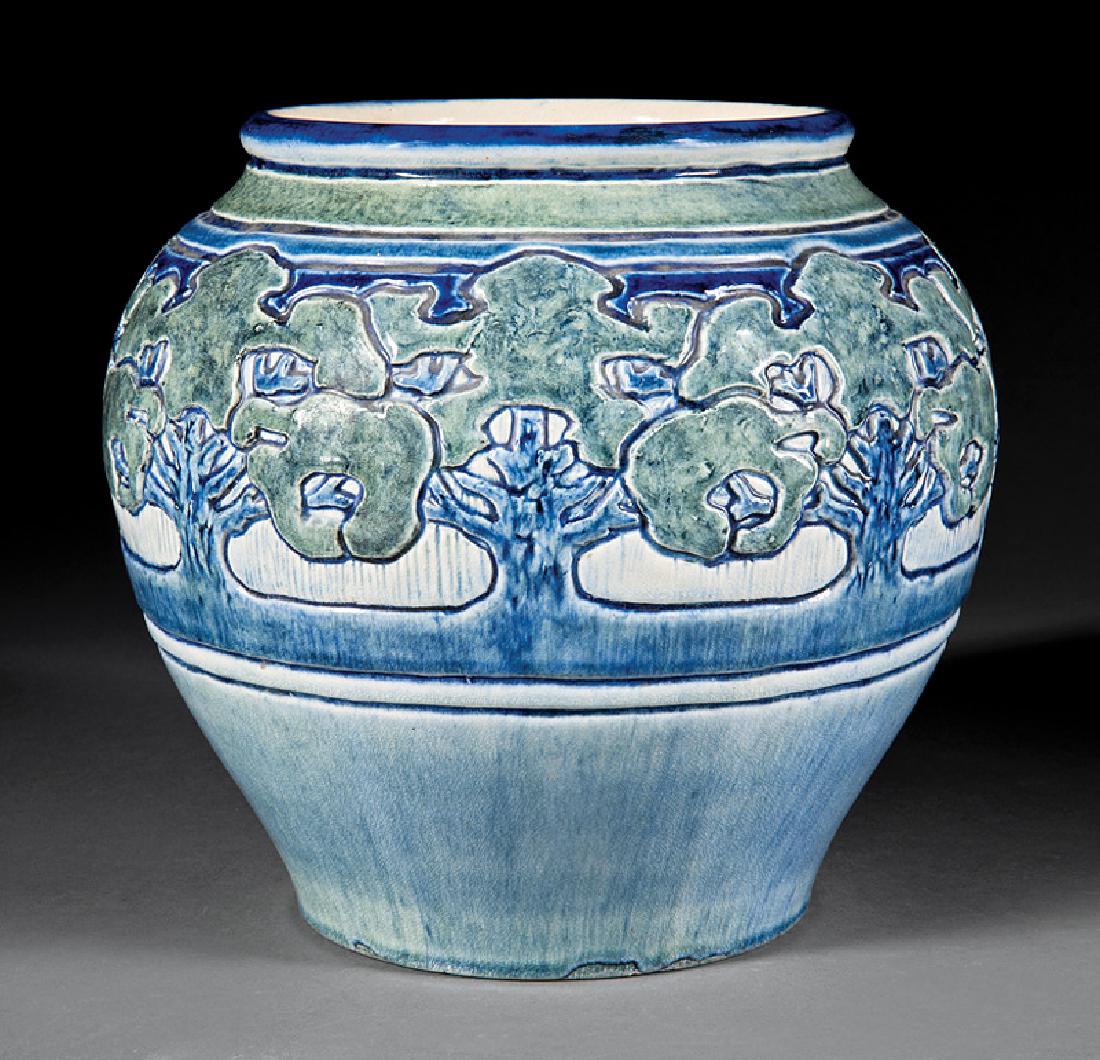 Newcomb College Art Pottery High Glaze Jardiniere: Newcomb College Art Pottery High Glaze Jardiniere, 1906, decorated by Leona Nicholson with an incised design of stylized oak trees, blue and green underglaze, base marked with Newcomb cipher, decorato