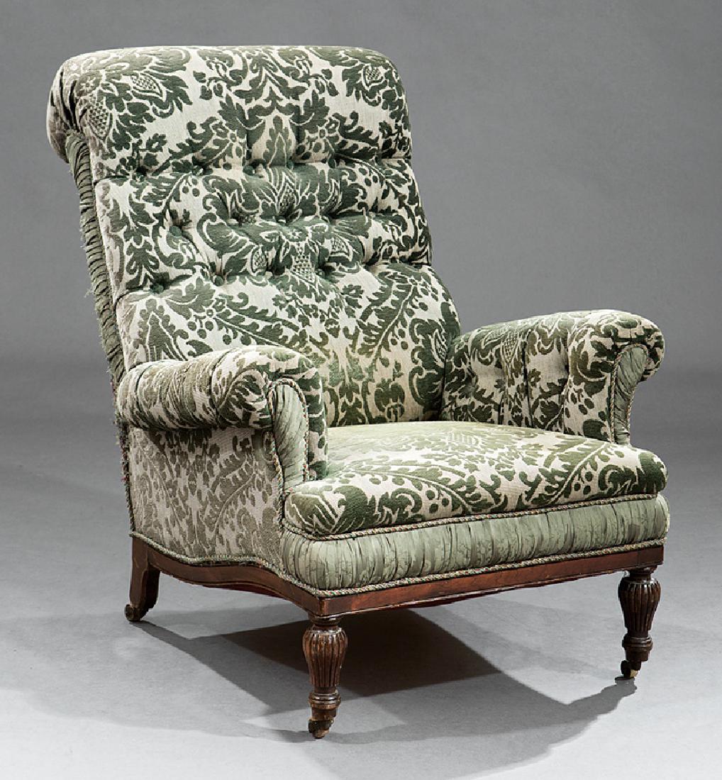 Edwardian Upholstered Mahogany Library Armchair: Edwardian Upholstered Mahogany Library Armchair, late 19th/early 20th c., scrolled arms, straight seat rail, reeded legs, casters, h. 39 in., w. 31 1/2 in., d. 28 in
