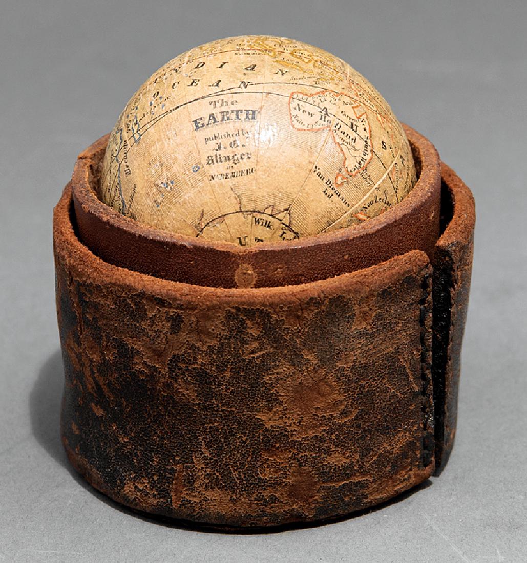 Miniature/Pocket Globe, Johann Georg Klinger: German Miniature/Pocket Globe, c. 1840, by Johann Georg Klinger, the cartouche reads "The Earth/published by/J.G./Klinger/in/Nuremberg", 2 1/4 in., published in English, in original leather case (now 
