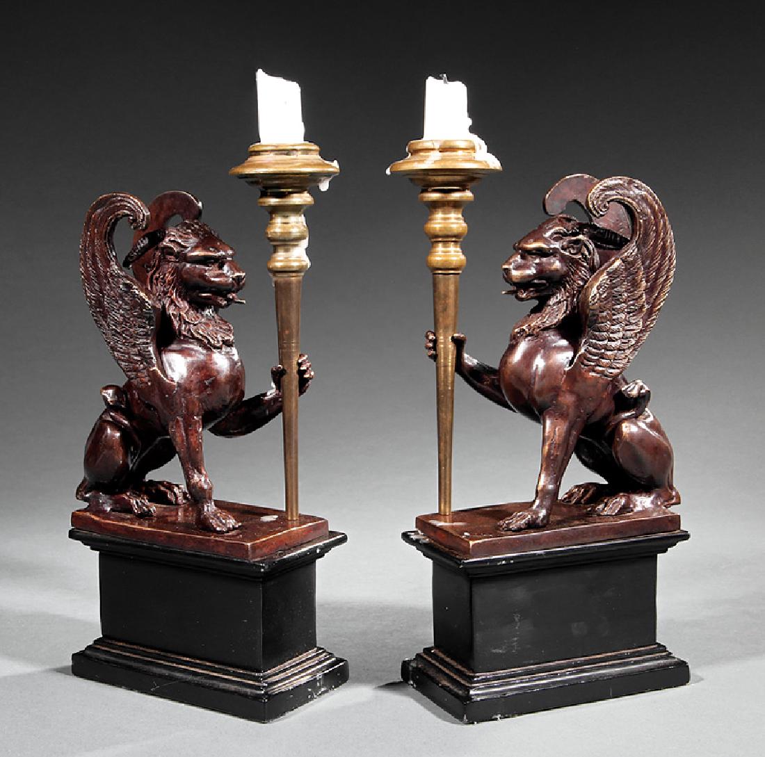 Patinated Bronze Griffin Figural Candlesticks: Pair of French Patinated Bronze Griffin Figural Candlesticks, mid-19th c., each holding torchere, plaster plinth base, h. 11 1/2 in., w. 5 1/2 in., d. 3 in