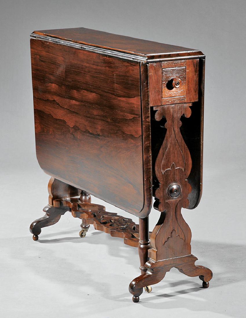 Rosewood Sunderland Tale, Meeks: American Late Classical Rosewood Sunderland Table, c. 1840, J. & J.W. Meeks, New York, stenciled label, deep drop leaves, frieze drawers, trestle base, pierced stretcher, h. 29 in., extended l. 44 3/4