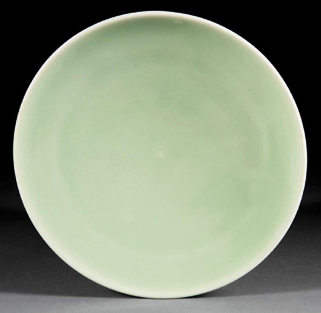 Chinese Pale Green Glazed Porcelain Dish: Chinese Pale Green Glazed Porcelain Dish, probably early 20th c., dia. 11 5/8 in, accompanied by paperwork from the London Shop. Provenance: The London Shop, Royal Street, New Orleans