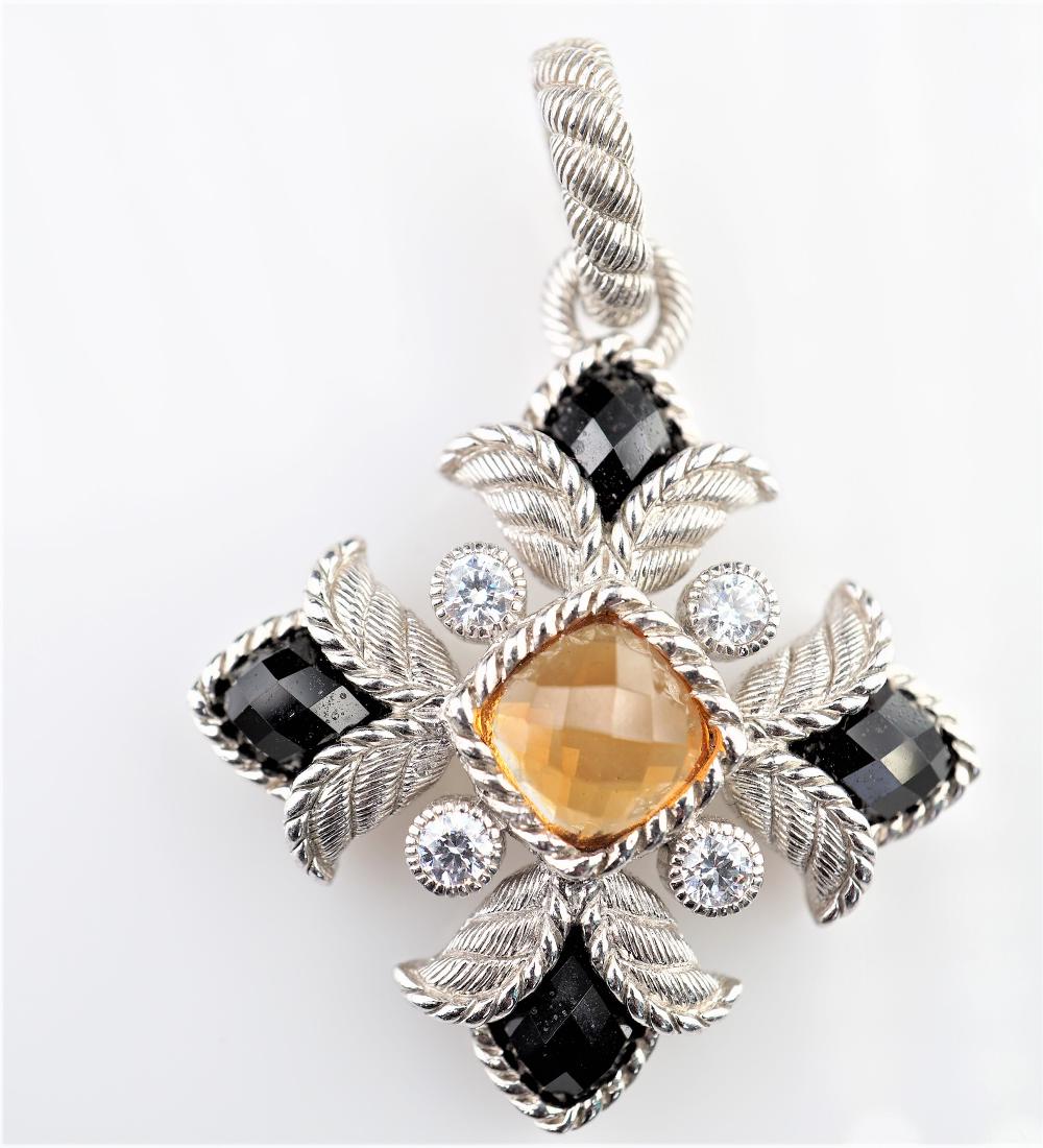 Judith Ripka Fleur de Lis Pendant: Judith Ripka Fleur de Lis pendant with citrine and onyx set in braided 925 sterling silver. Weighs 16.17 grams and is 1.5" long.