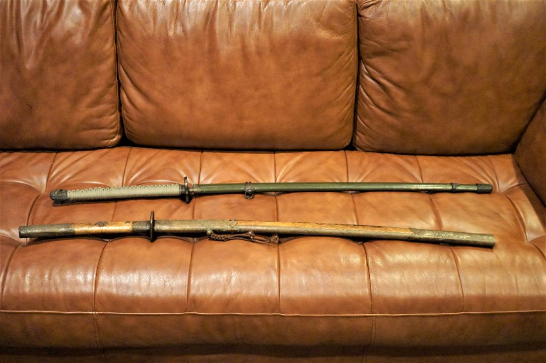 Pair of Antique Japanese Katanas (Edo & WWII): Pair of 2 antique Japanese Samurai swords/katanas. One an Edo period 43" inch long sword with an exotic animal skin sheath and handle. Period tsuba with silver and gold engraving on the blade. The oth