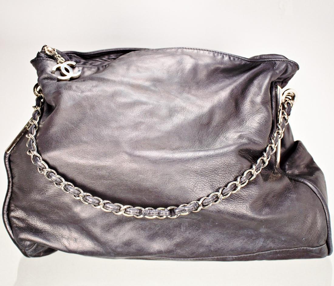 Lambskin Black Chanel Bag with Embossed Interlocking C (1 of 10)