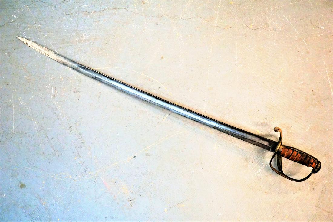 Leather Wrapped Sword: Leather wrapped handle bronze sword. Measures 40.5" from tip to heel.