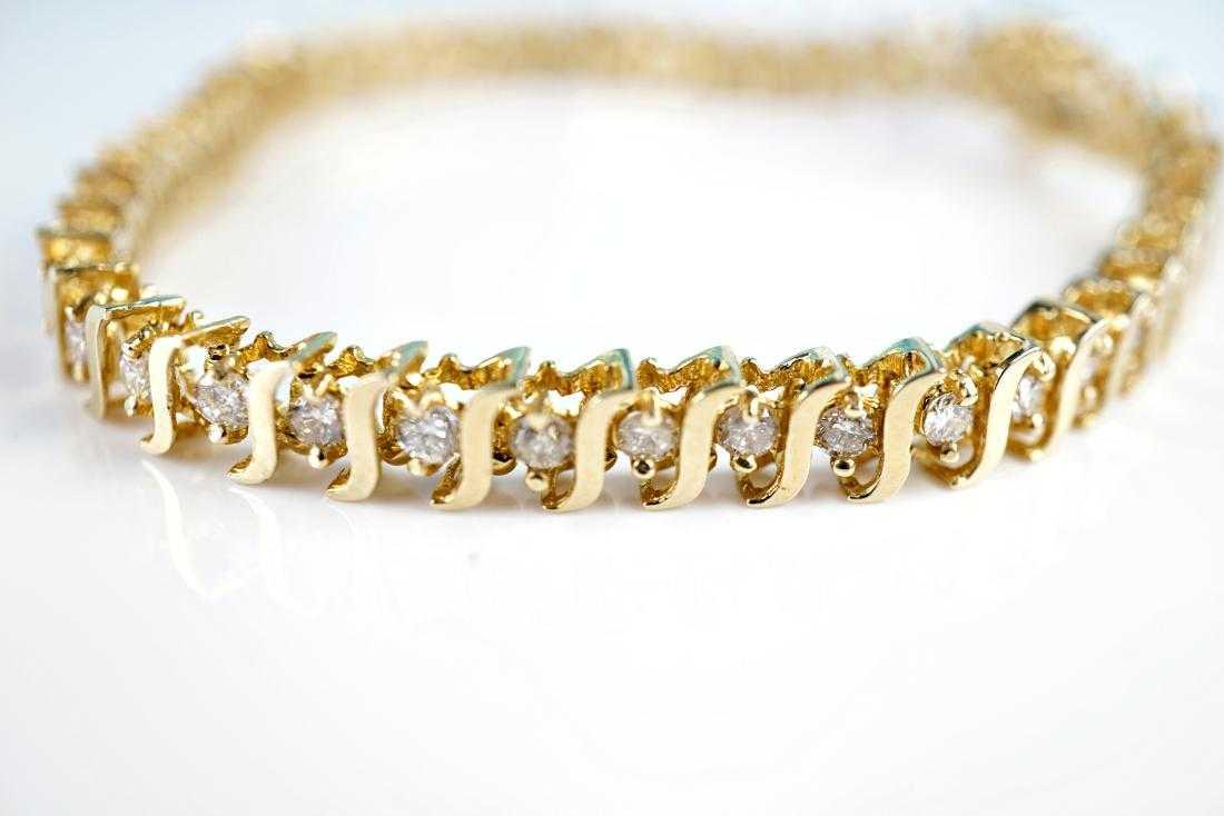 14k YG 7.5" 1.75 CTTW Diamond Tennis Bracelet: 7.5" long 14k Yellow gold 1.75 CTTW of brilliant cut white diamond tennis bracelet