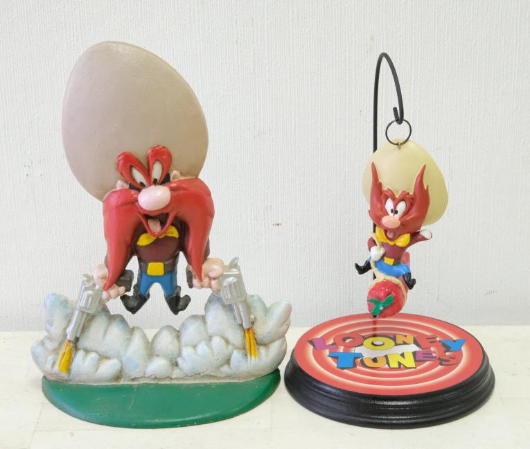 Yosemite Sam Door Stop & Hanging Ornament: Looney Tunes scarce painted cast iron Yosemite Sam Doorstop with hanging figure on Looney Tunes Stand. Approx. height of doorstop 9.5".
