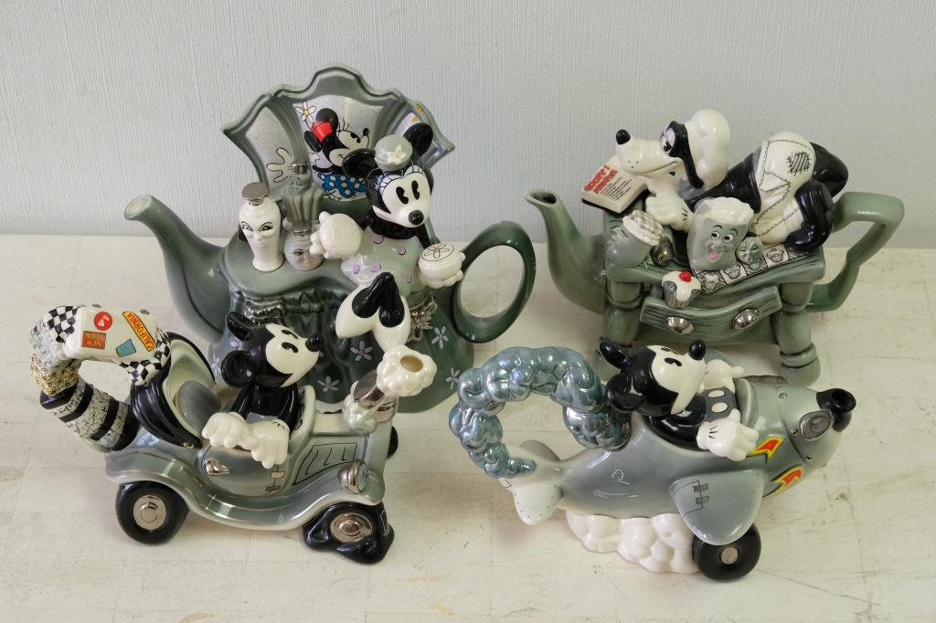 Group, Four Paul Cardew for Disney L.E. Teapots: A group of four Paul Cardew for Disney Showcase Limited edition teapots comprising Minnie Mouse Dressing Table (#1851/500), Goofy Baking Day(#1847/5000), Automobile Mickey (#1544/5000) andAviator Mick