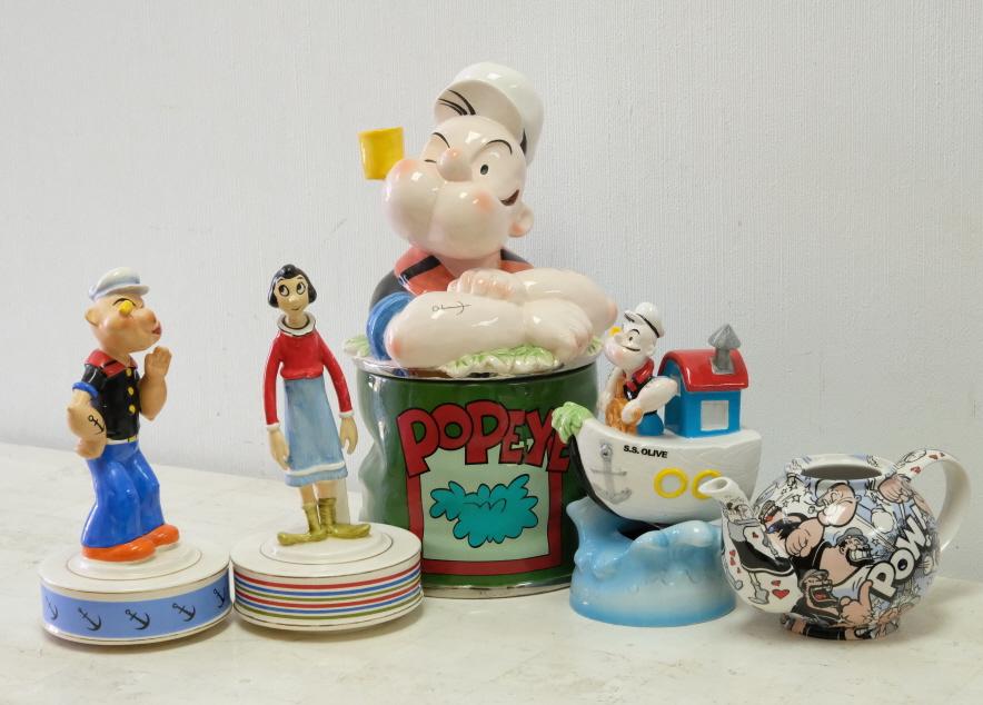 Five PC TOON ART Popeye and Olive Oyl Group: Group of five pieces King Feature Syndicate Comprising a large Enesco Popeye Cookie Jar, Popeye musical figurines, Olive Oyl musical figurine and teapot (lack lid).Approx. height tallest 12.5".
