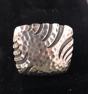 John Hardy Large Sterling Hammered Ring: John Hardy sterling silver large hammered ring.Size 8.Approx. weight .9 ounces.