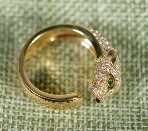 18k YG Diamond Panther Ring sz 8: 18k Yellow gold with VS brilliant cut white diamonds "Panther" Ring. With pear shaped emerald eyes and onyx nose. Bears the Cartier signature,hallmark and serial number. Sold without paperwork. Size 8