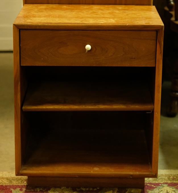 Drexel Kipp Stewart Declaration Night Stand Table: Designed by Kipp Stewart (United States, b.1928)for Drexel Furniture, circa 1960's.Mid-century modern walnut nightstand or bedside table, in the"Declaration" pattern, having angled trapezoid front wit
