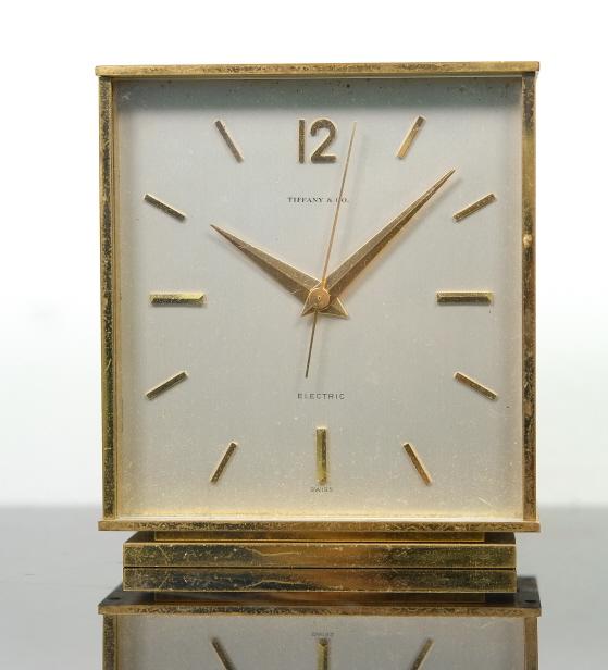 Vintage Tiffany & Co Electric Swiss Desk Clock: Concord Watch Co for Tiffany & Co Swiss electric desk clock. Dial inscribed Tiffany & Co/Electric/Swiss, the movement stamped 1266/SWISS/ 1DIV = 5 SEC./24H, back of case CONCORD WATCH CO/SWISS. Approx