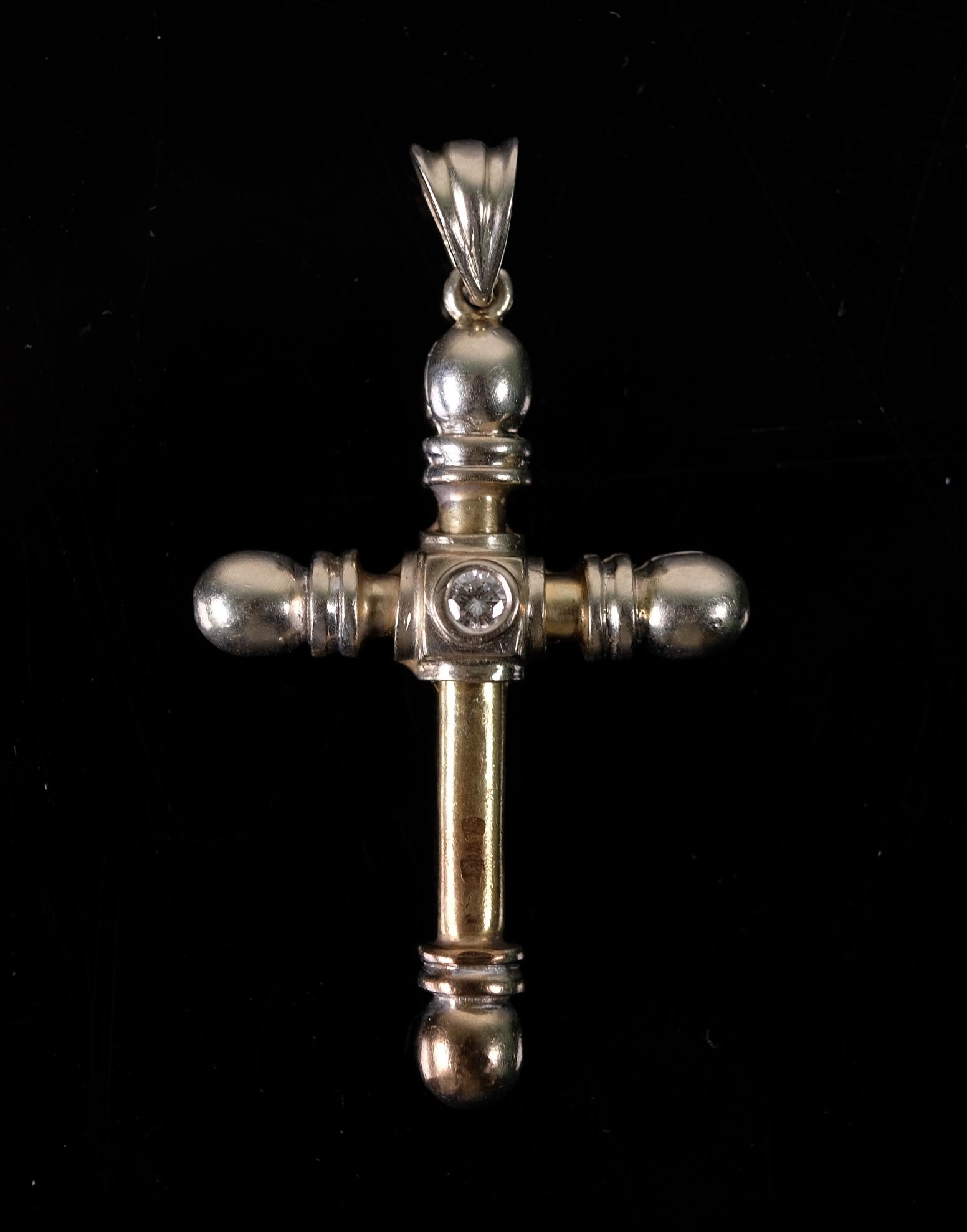 14K YG Cross Pendant w/Center Diamond: 14K yellow gold cross pendant having a center round brilliant diamond. Faint illegible marks. Tested as 14K gold purity. Approx. overall weight 5.41 grams.