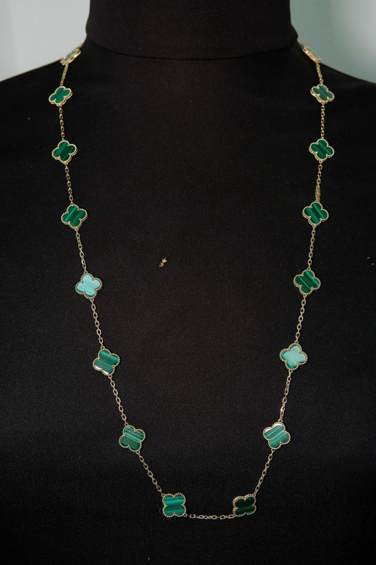 18K YG Malachite 20 Motif Alhambra Necklace: Attributed to Van Cleef and Arpels, Alhambra 20 Motif 18K yellow gold and malachite necklace. Stamped OR VCA AU750/JE539778 and clasp stamped VCA S811. Approx. length 32 inches. Approx. overall weight